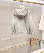 White hooded jacket with full back view and front zipper, elastic cuffs and hem