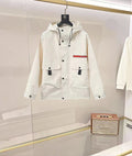 Prada hooded long jacket in white with button front and drawstring neckline
