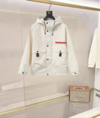 Prada hooded long jacket in white with button front and drawstring neckline
