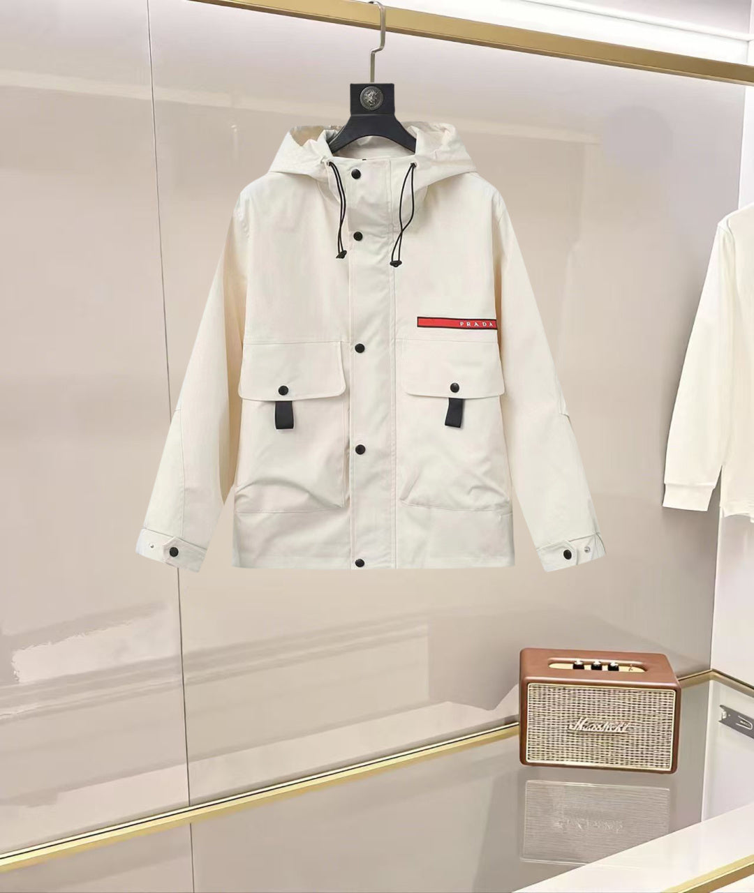 Prada hooded long jacket in white with button front and drawstring neckline