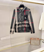 Burberry hooded jacket in dark gray with red and white check, front zip and pockets