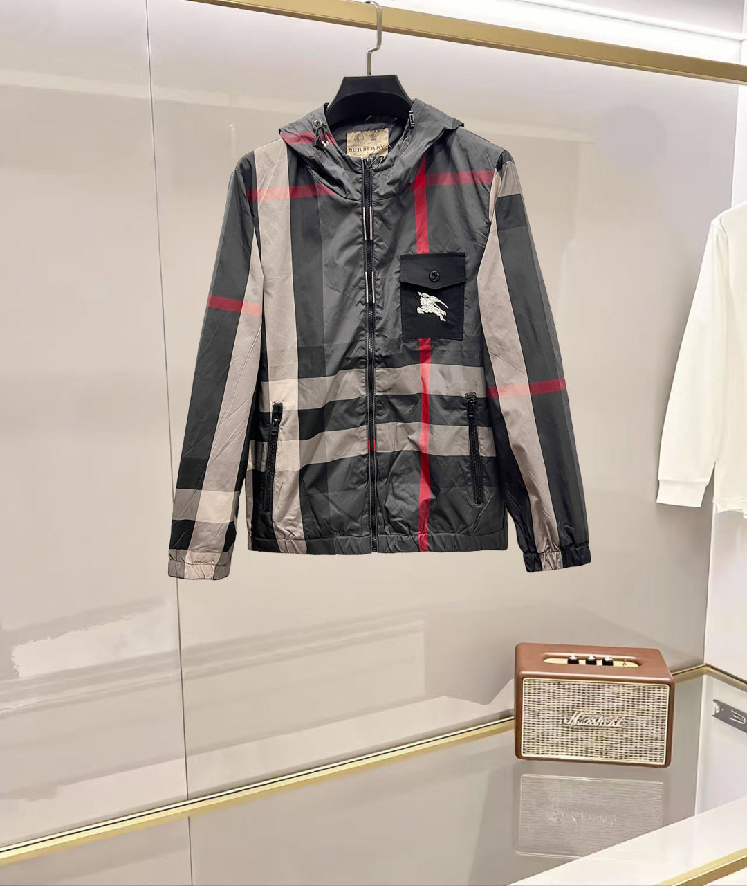 Burberry hooded jacket in dark gray with red and white check, front zip and pockets
