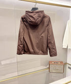 Taupe hooded zip jacket with back yoke seam and gathered hood