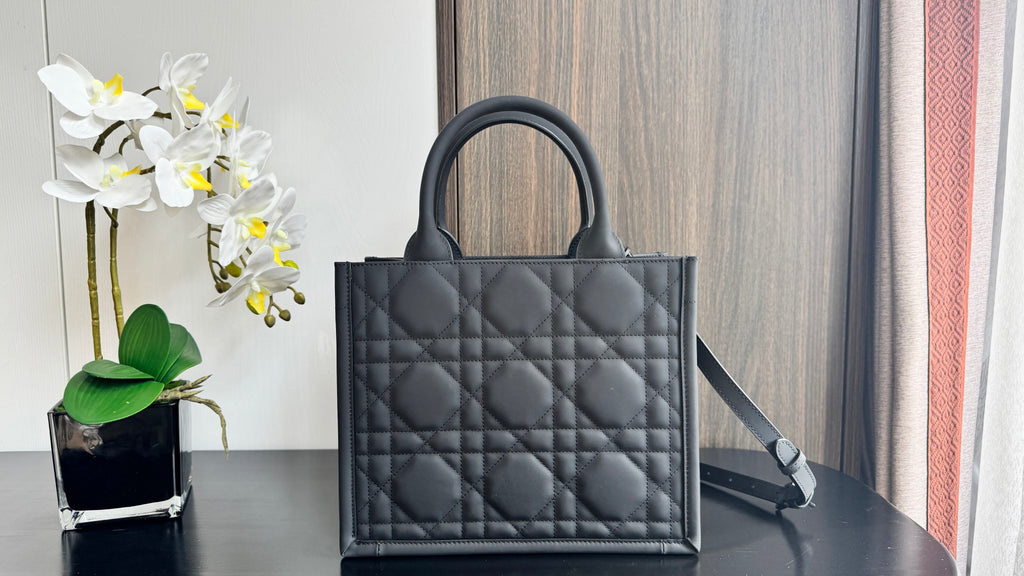 Dior quilted tote bag with top handles and removable strap, dark leather diamond pattern
