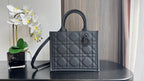 Dior quilted tote bag with top handles and side strap, dark leather with diamond stitching