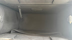 Interior of Dior leather pouch with side seams and zip pocket panel