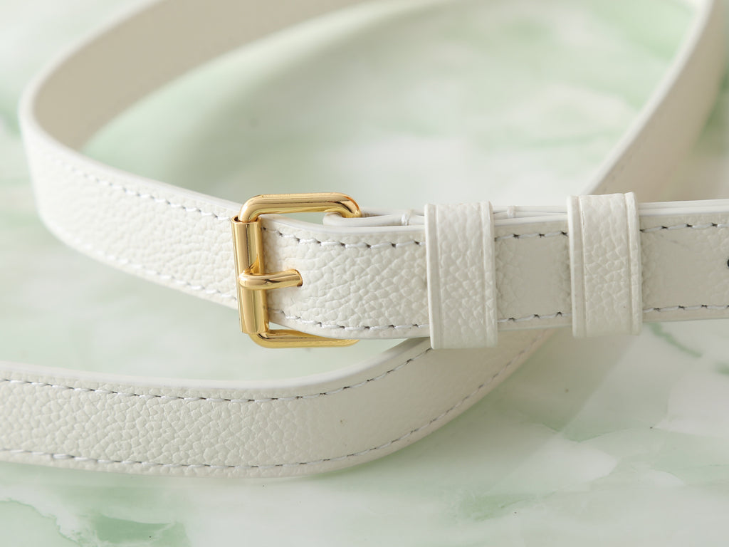 Louis Vuitton adjustable strap end with gold buckle on white pebbled leather