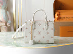 Louis Vuitton bag in white with monogram pattern, top handles and removable strap