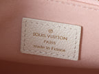 Louis Vuitton bag leather label reading Louis Vuitton Paris, made in France