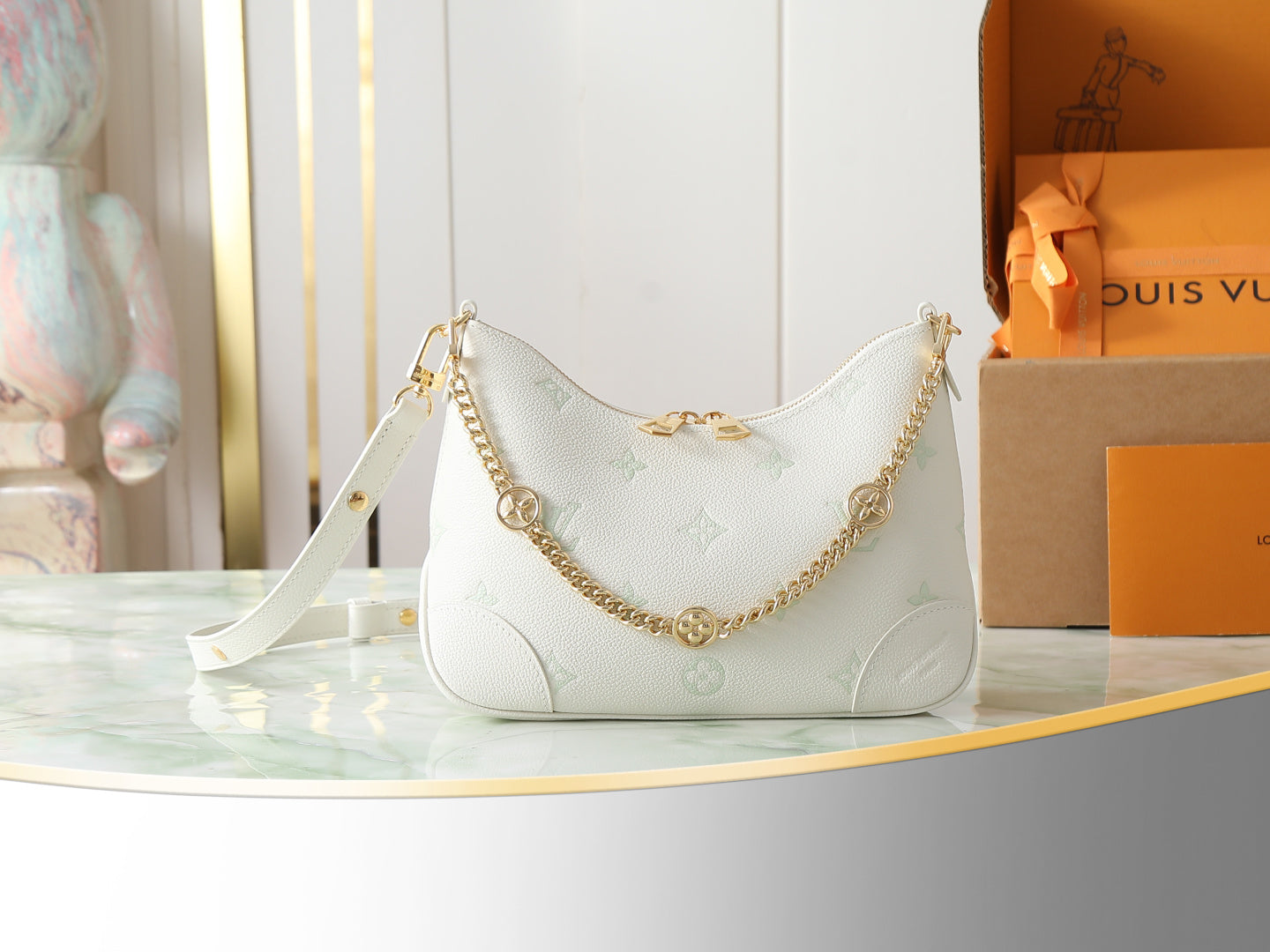 Louis Vuitton white hobo bag with gold chain strap