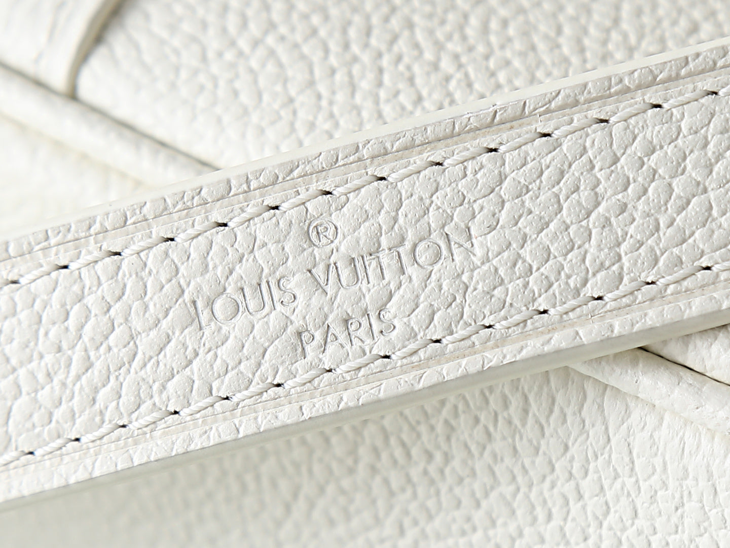 White leather strap with Louis Vuitton Paris embossing