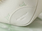 White leather bag base with embossed monogram detail