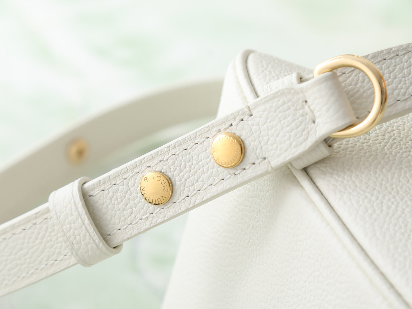 Louis Vuitton bag leather strap with gold hardware and buckle ring