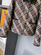 Burberry quilted plaid jacket with belt tie and buttoned pockets