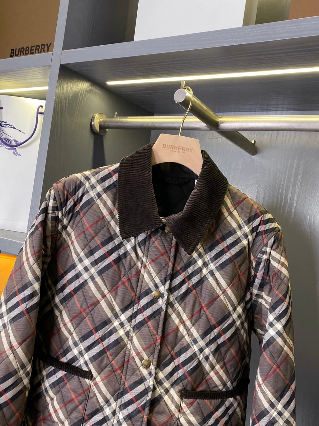 Burberry quilted plaid jacket with dark corduroy collar and snap buttons