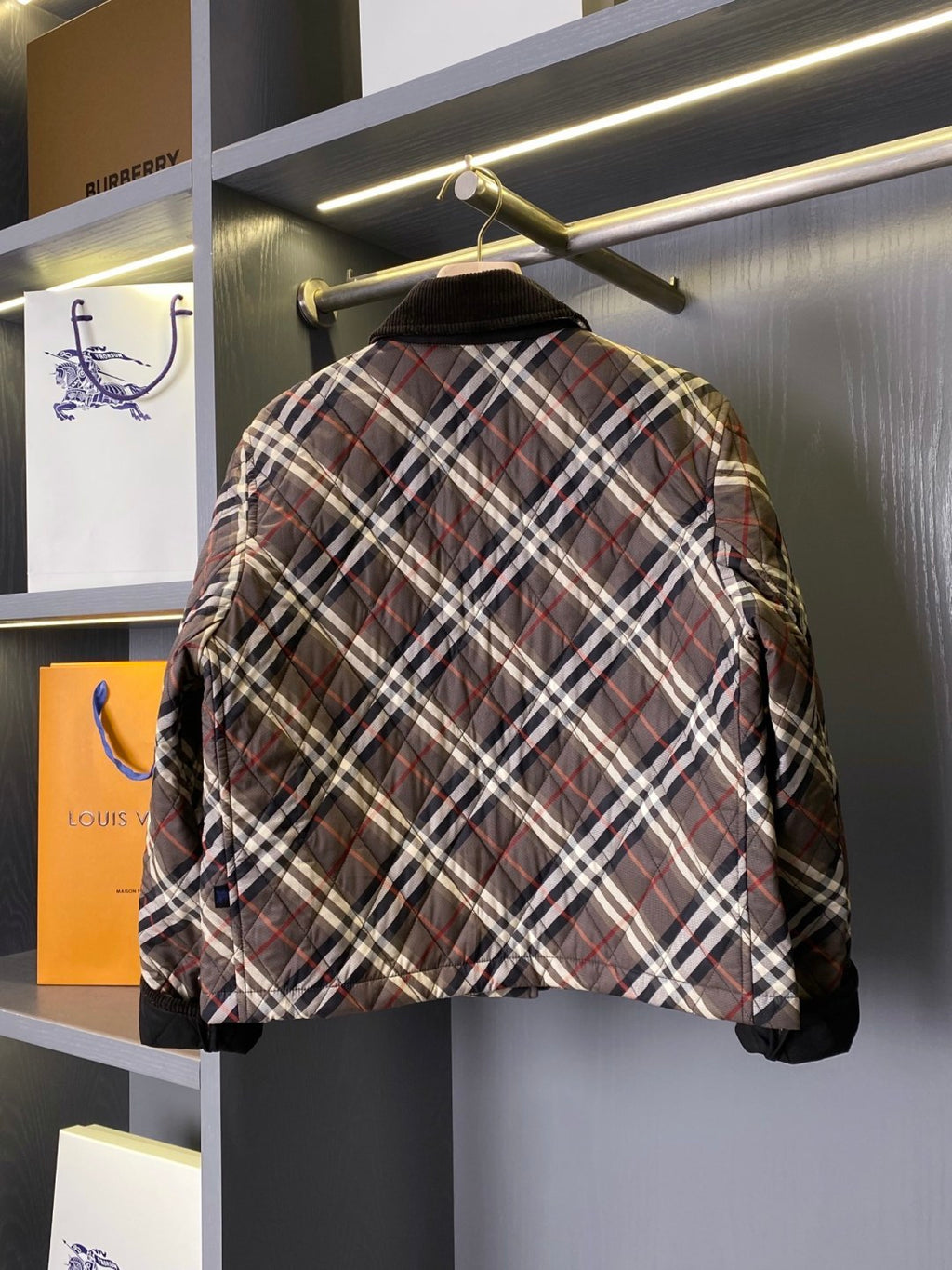 Burberry quilted plaid jacket back view with dark collar