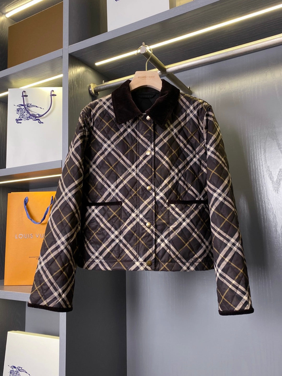 Burberry quilted plaid jacket with dark collar and snap-button front
