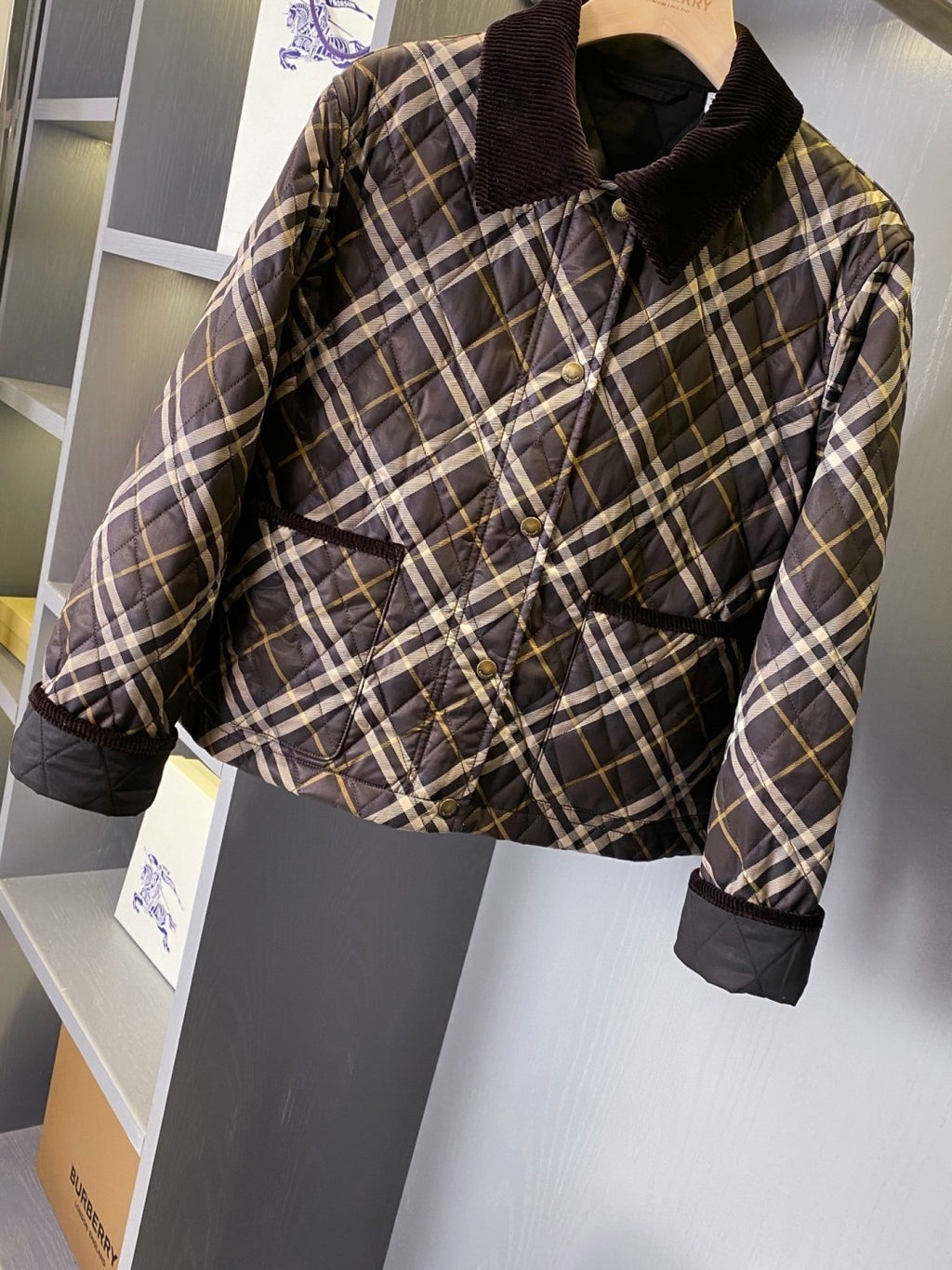 Burberry plaid quilted puffer jacket with dark pocket and front buttons