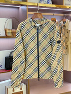 Burberry plaid zip jacket, cream with green and navy checks, black zipper down front