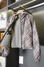 Plaid hooded jacket with front zipper and horse logo patches on chest and sleeve