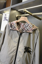 Plaid hooded jacket with front zipper and horse logo patch on the chest
