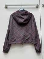 Burberry hooded plaid jacket back view with draped hood and elastic cuffs.