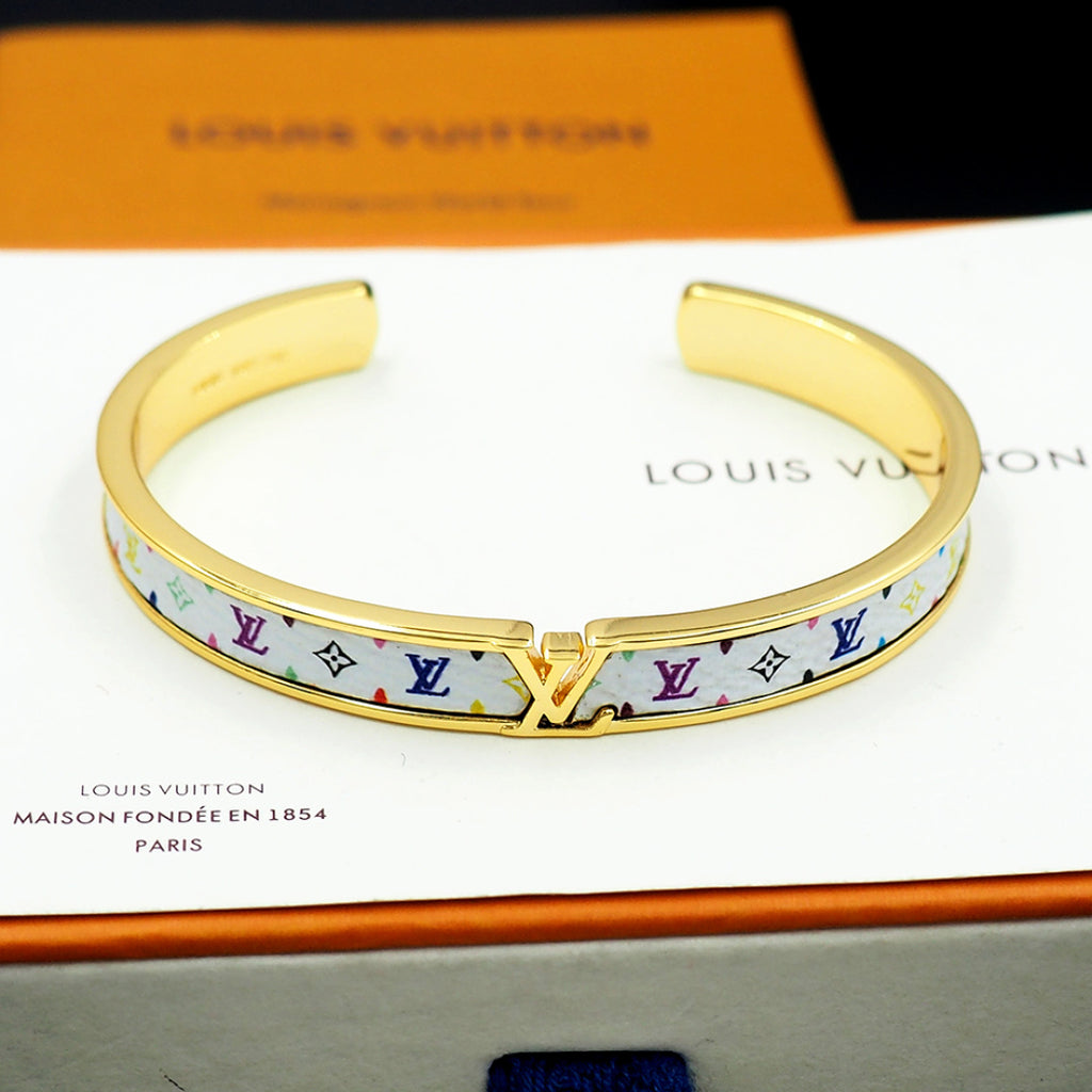 Louis Vuitton monogram cuff bracelet with gold-tone interior and multicolor LV band