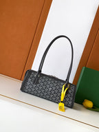 Small monogram tote bag with black handles and gold zipper hardware