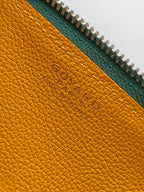 Goyard interior leather label, yellow panel with embossed logo near zipper
