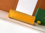 Goyard yellow monogram handbag with wide front strap and flap