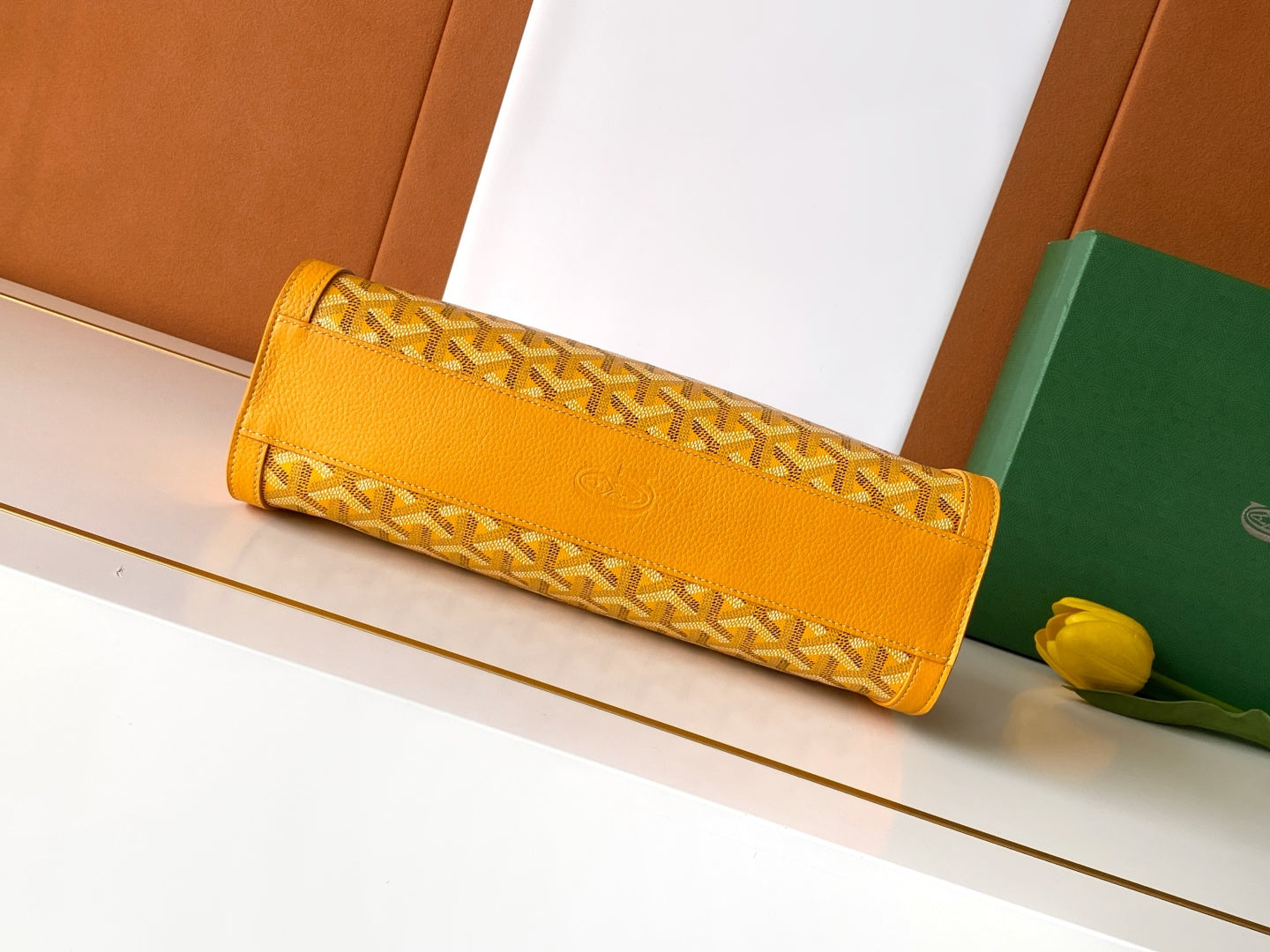 Goyard yellow monogram handbag with wide front strap and flap