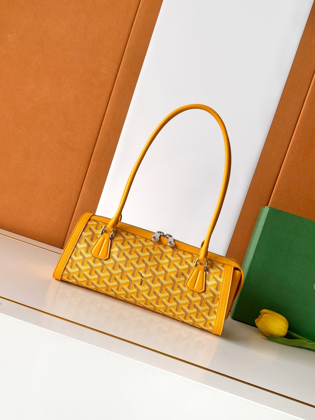Goyard yellow monogram handbag with top handles and front hardware