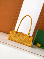 Goyard yellow monogram handbag front view with top handles