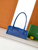 Blue Goyard patterned tote bag with arched top handles and front clasp