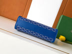 Blue Goyard patterned clutch bag with flap and long rolled silhouette