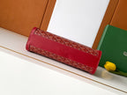 Red long slim zip-top bag with top handle and patterned front panel