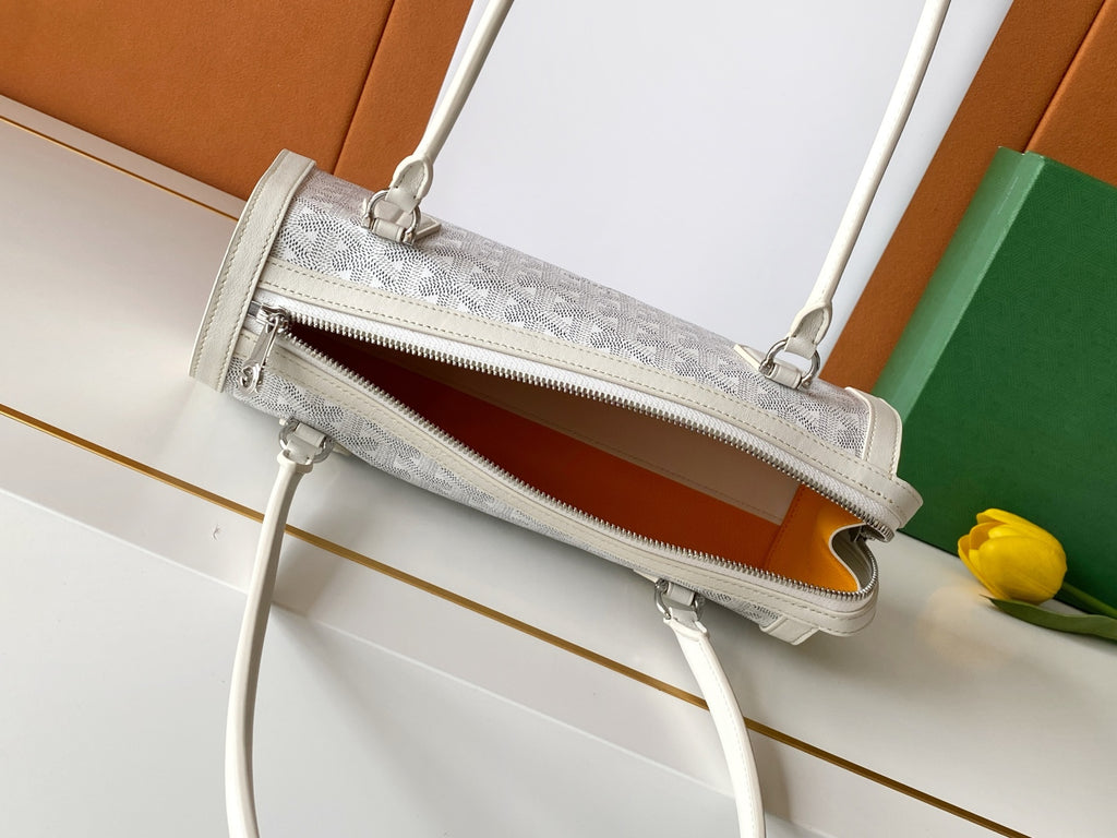 Goyard white bag with front zipper opening and leather trim