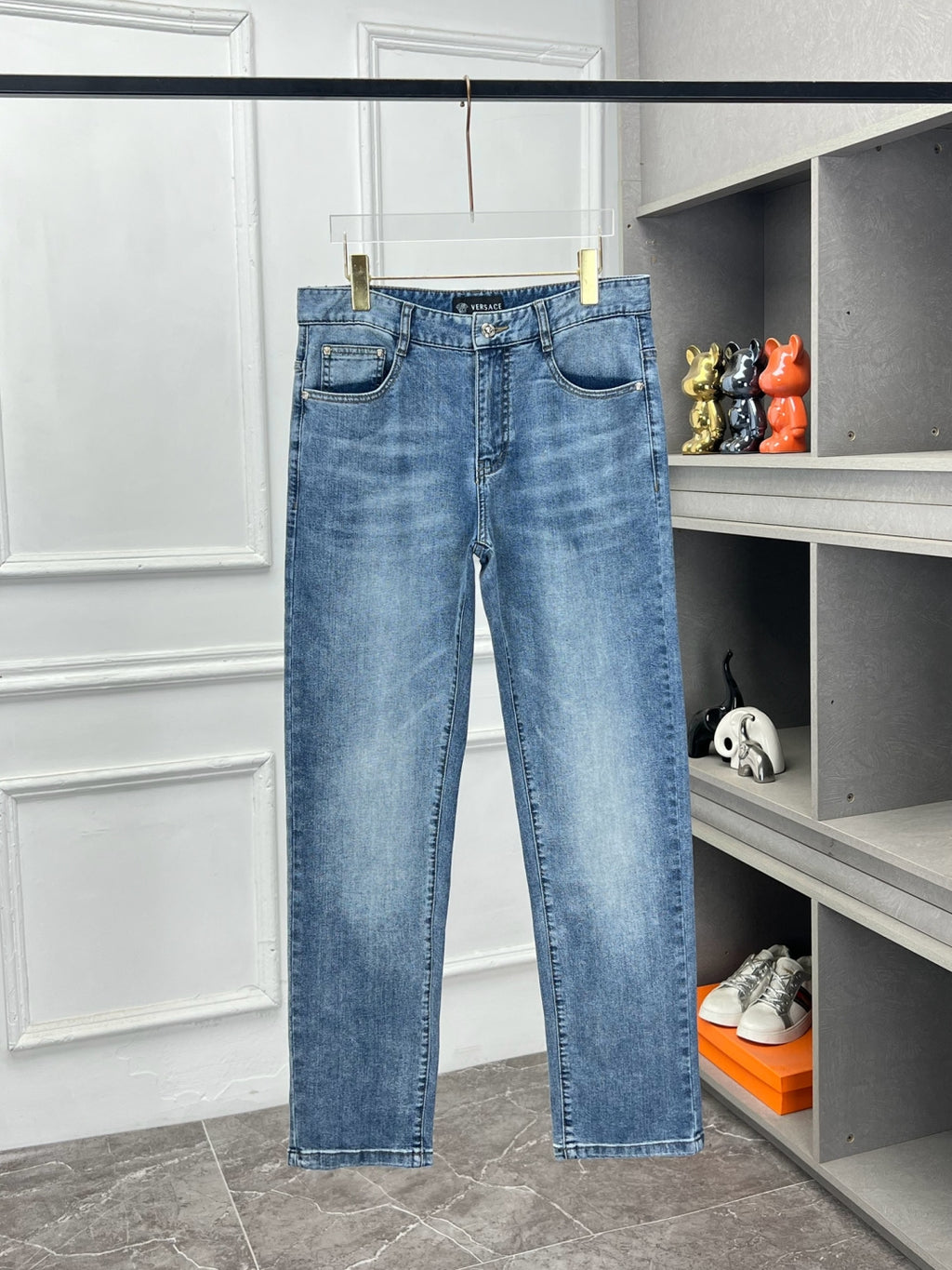 Versace light blue denim jeans, five-pocket style with stitched detailing