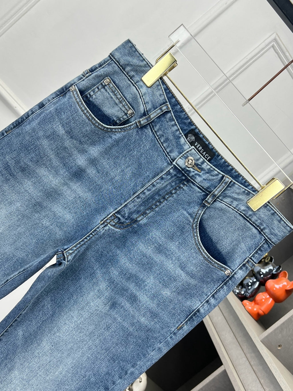 Versace denim jeans waistband with belt loops and metal logo button