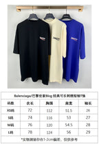Three short-sleeve T-shirts in black, cream, and blue with Balenciaga logo