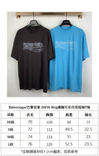 Black and blue Balenciaga-style crew-neck T-shirts with size chart panel