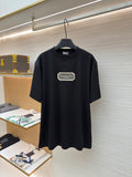 Dark navy short-sleeve T-shirt with Christian Dior couture logo patch