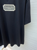 Dark navy T-shirt with Christian Dior couture logo patch and rounded hem