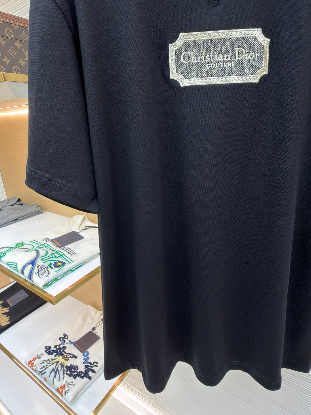 Dark navy T-shirt with Christian Dior couture logo patch and short sleeves