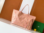 Pink patterned tote bag with leather top handles and open top view