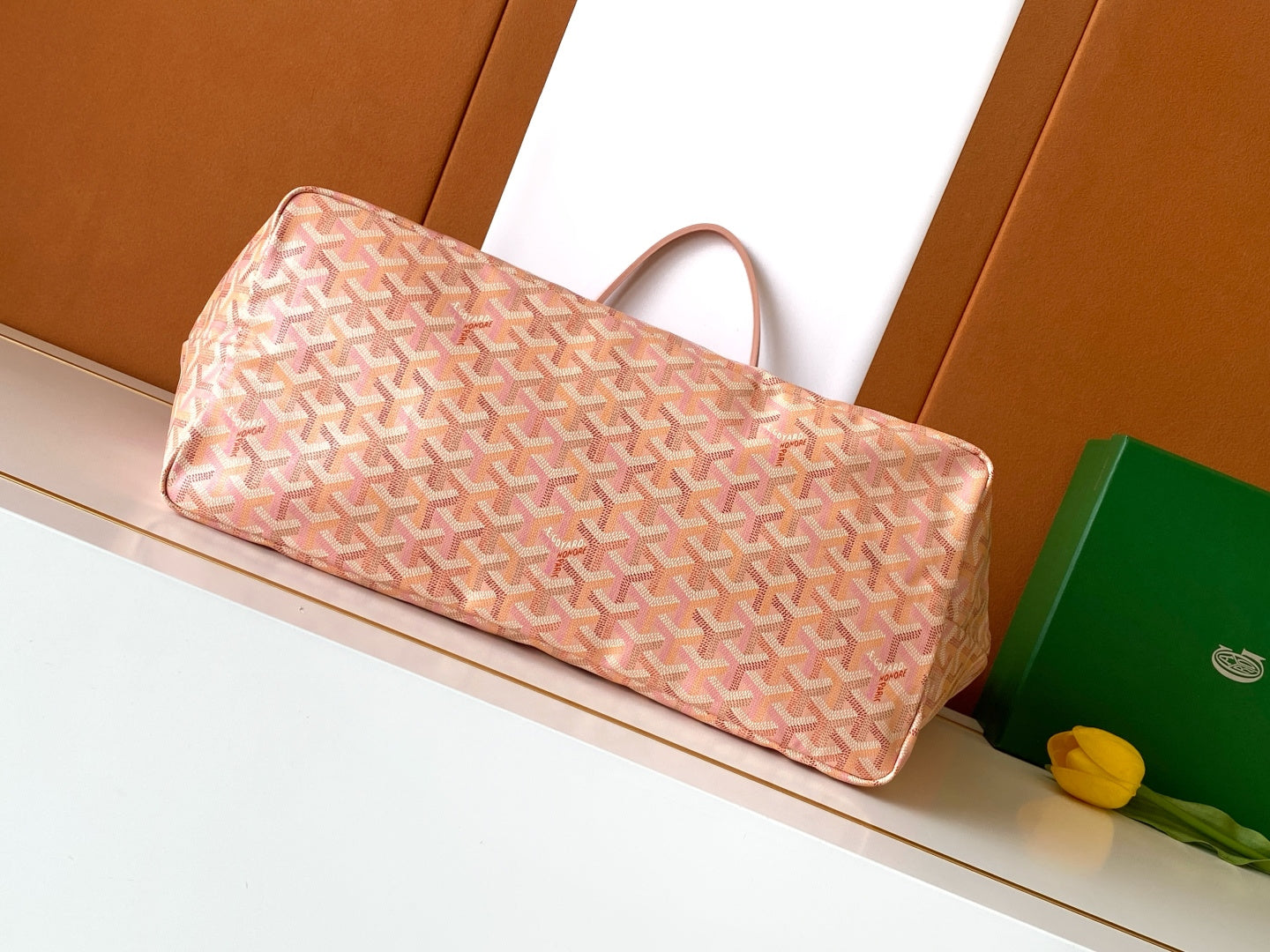 Rectangular pink patterned tote bag with long handles and open top