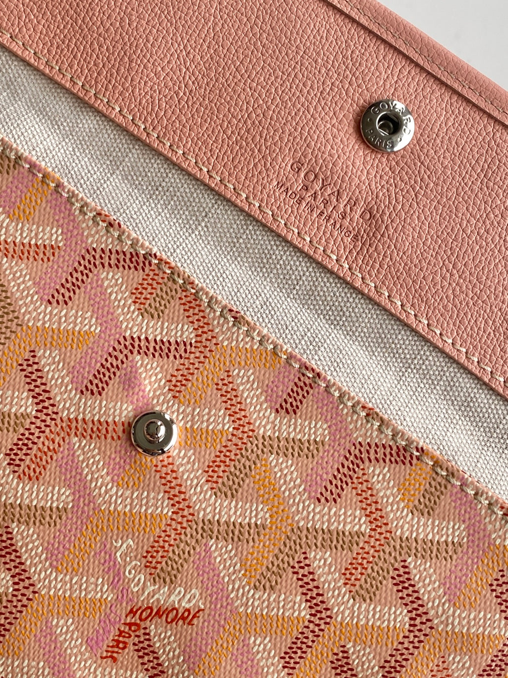 Pink patterned tote bag fabric with button snap and leather trim