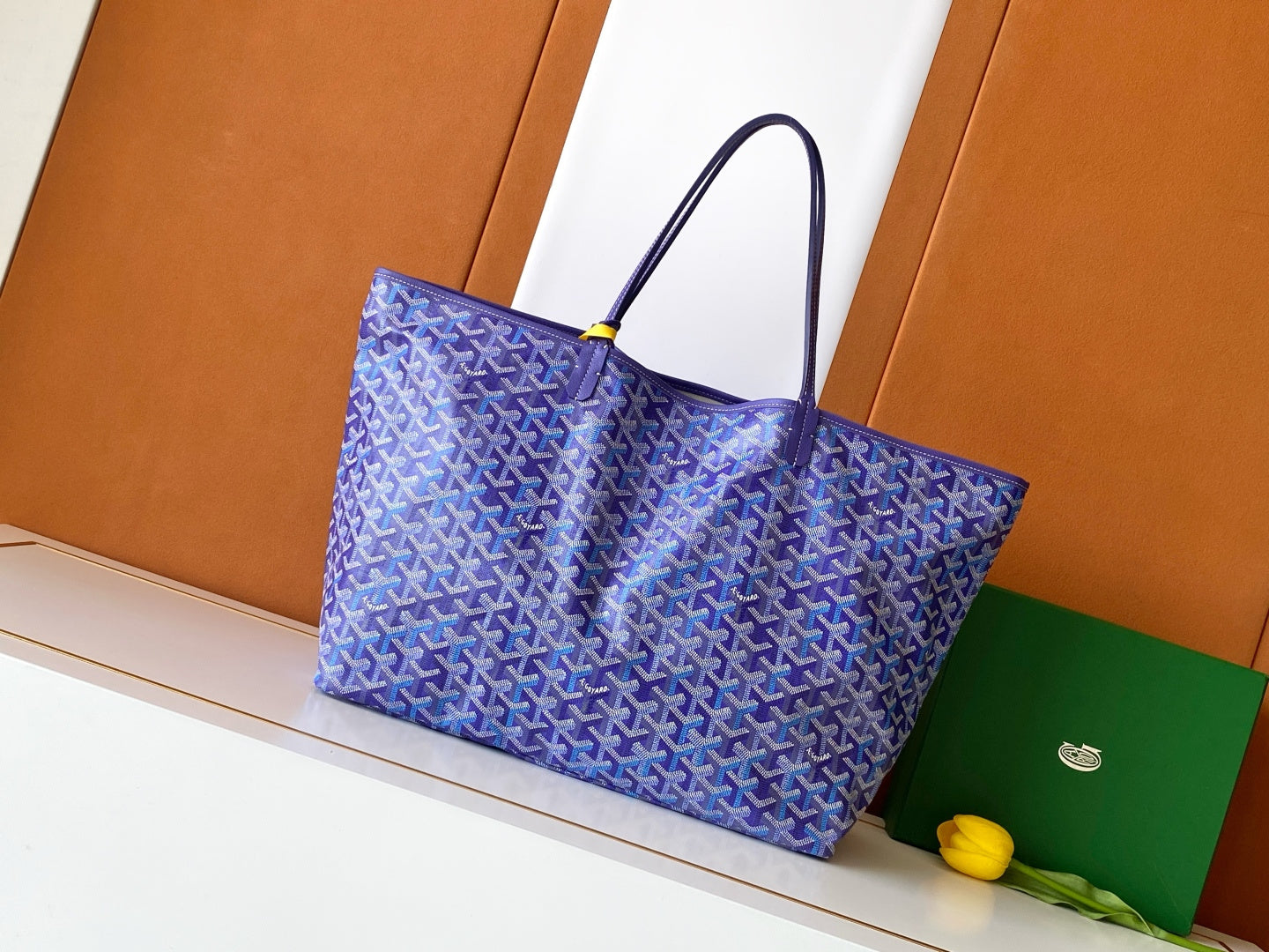 Purple monogram tote bag with top handles and open interior