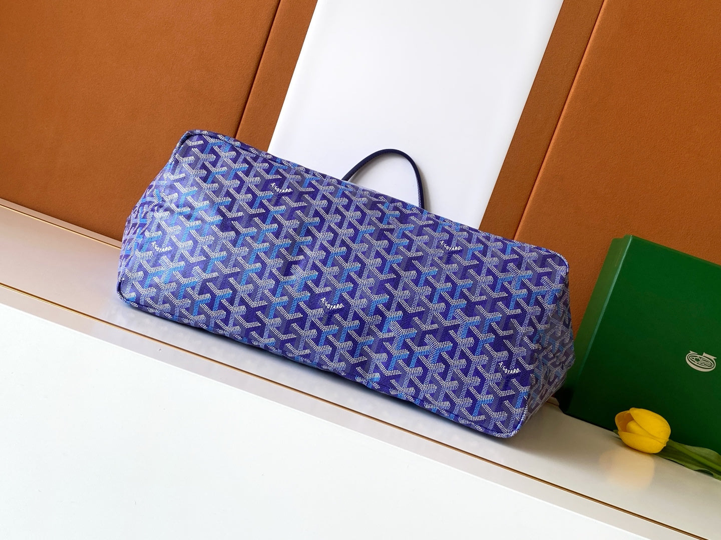 Purple monogram tote bag with long handles, laid horizontally