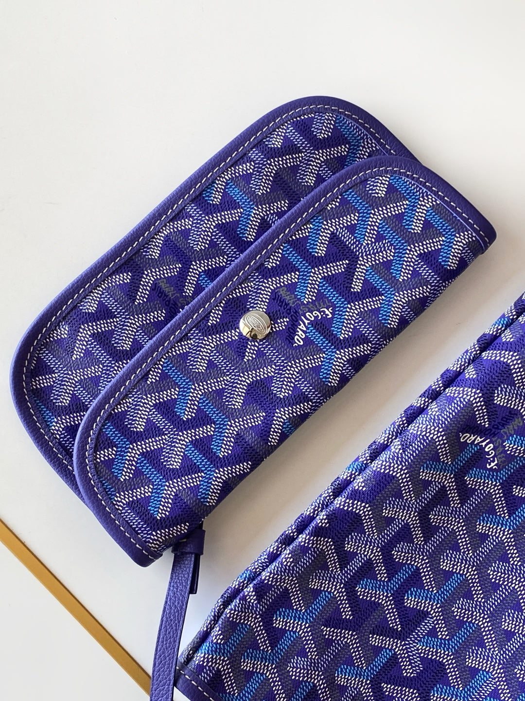 Purple monogram wristlet pouch with zip and matching strap